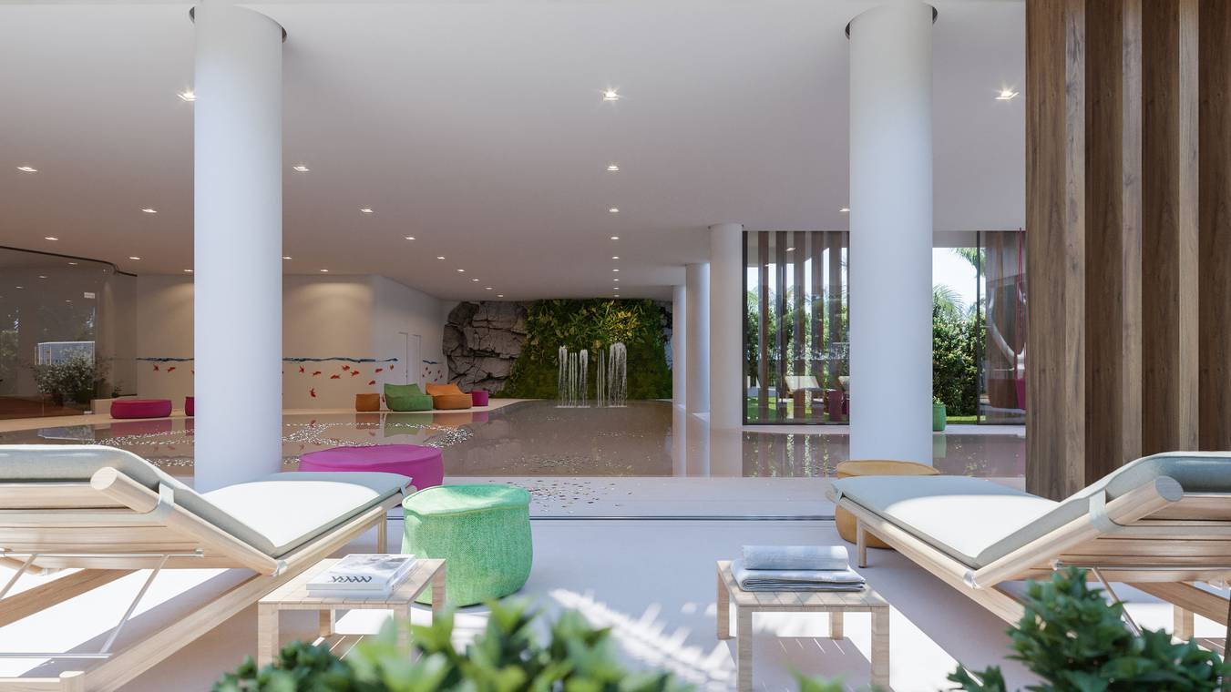 Χώρος ευεξίας με εσωτερική πισίνα και lounge σε σύγχρονο συγκρότημα κατοικιών στην Ibiza