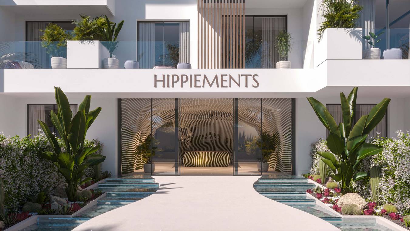Είσοδος του συγκροτήματος κατοικιών HIPPIEMENTS στην Ibiza με σύγχρονο lobby και οργανικό design