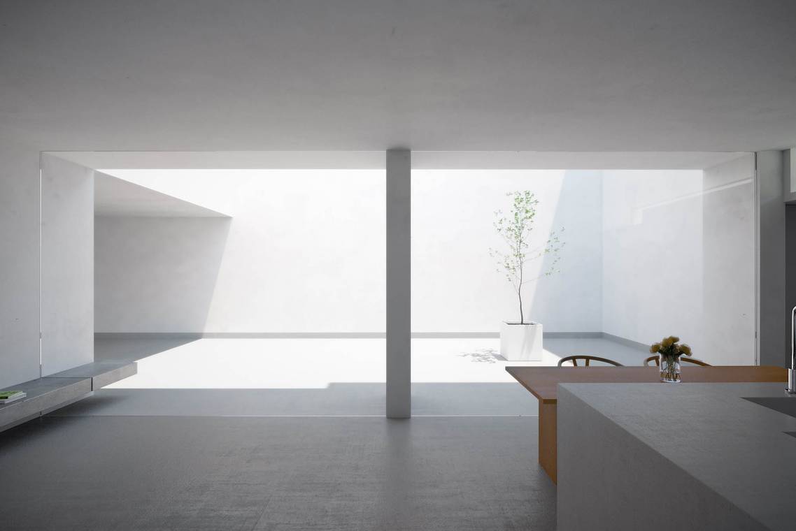 μινιμαλιστική κουζίνα με τραπεζαρία στο White Cave House